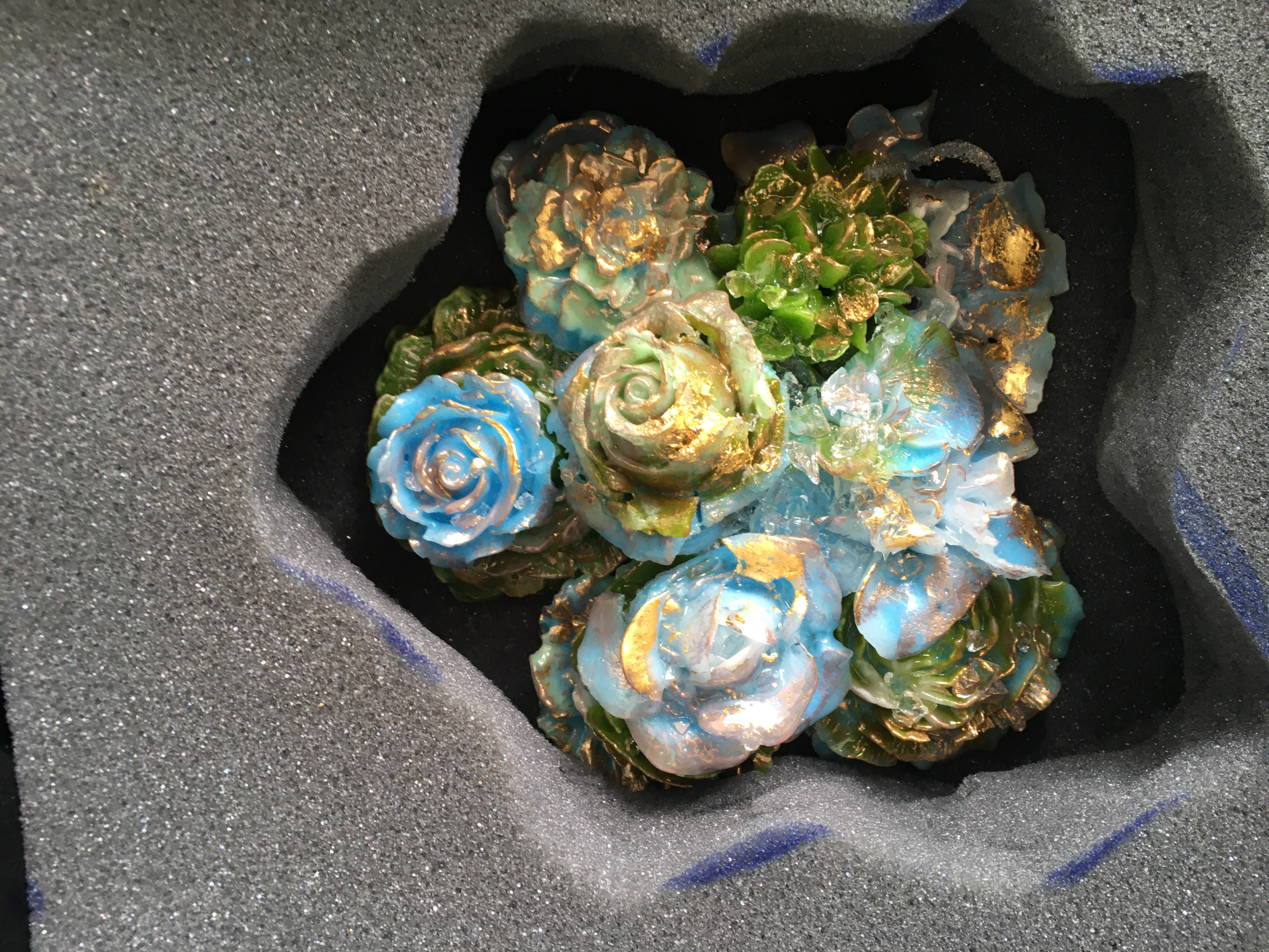 Blue and gold floral sculpture arrangement