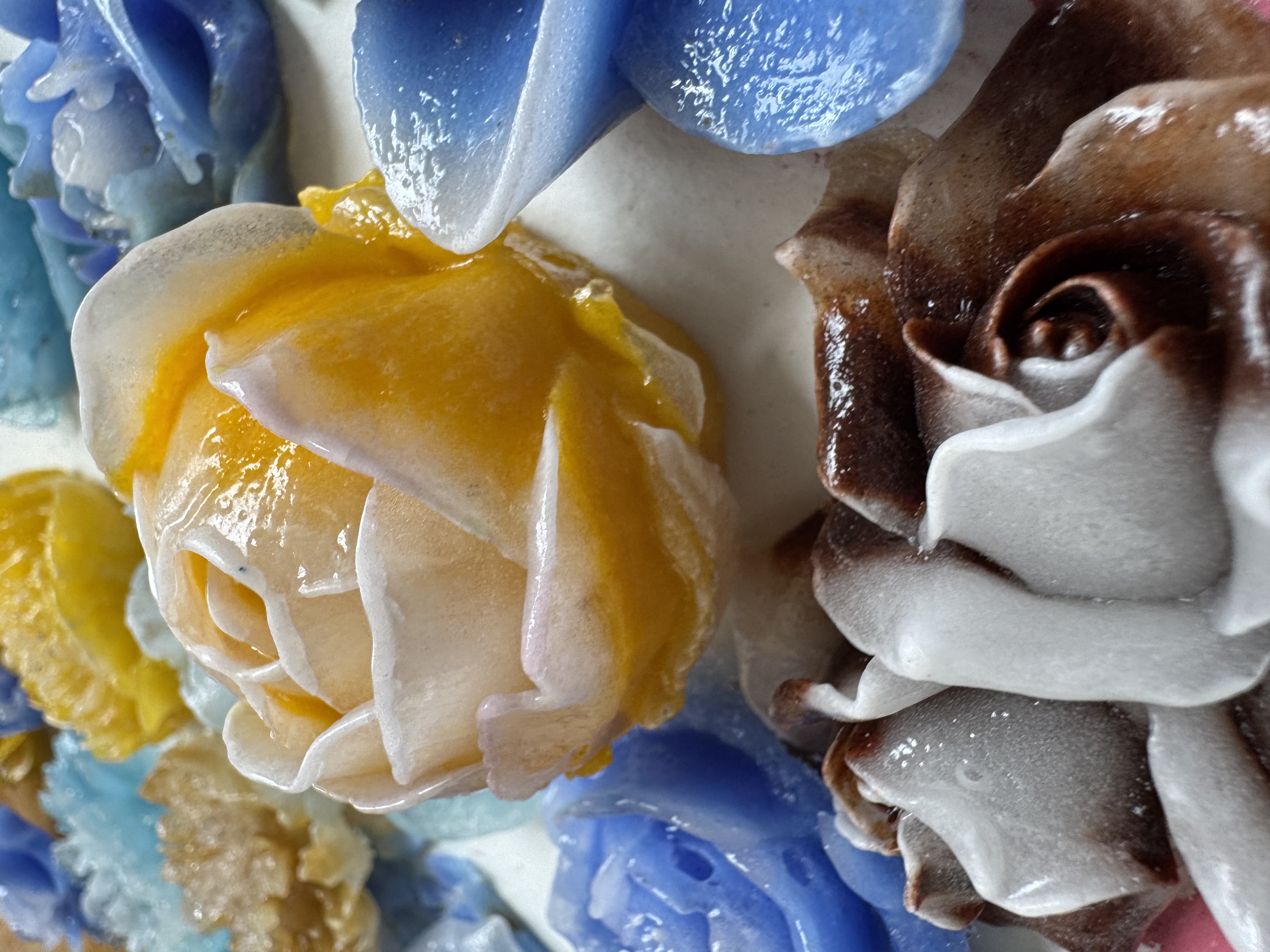 Floral sculpture detail with blue and gold